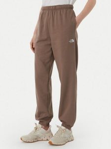 The North Face Spodnie dresowe Evolution Simple Dome NF0A8CWV Brązowy jasny Regular Fit. Brązowe spodnie dresowe The North Face, s, bez wzorów, z bawełny. Za 279,99 zł.