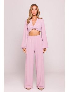 Made of emotion Spodnie w kolorze jasnoróżowym rozmiar: S. Różowe spodnie z wysokim stanem Made Of Emotion, bez wzorów, z materiału, z podwyższonym stanem. Za 113,90 zł.