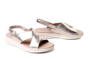 CAPRICE 9-28700-46 978 lt. gold metal. , sandały damskie. Żółte sandały Caprice, bez wzorów, bez obcasa, bez zapięcia. Za 271,92 zł.