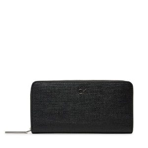 Portfel Calvin Klein. Czarne portfele Calvin Klein, bez wzorów. Za 179,99 zł.