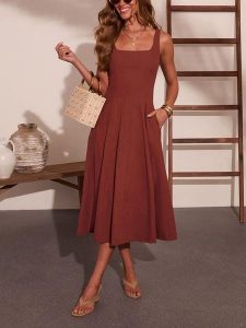 Milan Kiss Sukienka w kolorze brązowym rozmiar: L. Brązowe sukienki Milan Kiss, l, bez wzorów, bez kołnierzyka, bez ramiączek, midi. Za 239,95 zł.