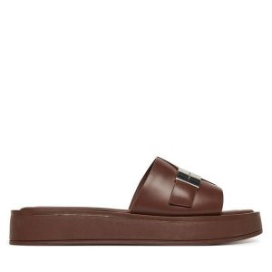 Klapki Calvin Klein. Brązowe klapki Calvin Klein, bez wzorów, bez obcasa. Za 329,99 zł.