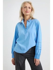 Josephine & Co Bluzka "Andreas" w kolorze błękitnym rozmiar: 38. Niebieskie bluzki Josephine & Co, bez wzorów, z lyocellu, bez kołnierzyka, bez ramiączek. Za 212,45 zł.