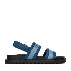 Sandały Guess Jeans. Niebieskie sandały Guess Jeans, z aplikacjami, z jeansu, bez obcasa, na płaskiej podeszwie, bez zapięcia. Za 249,99 zł.