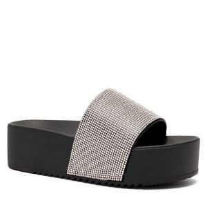 Klapki Clara Barson. Czarne klapki Clara Barson, bez wzorów, bez obcasa. Za 49,99 zł.