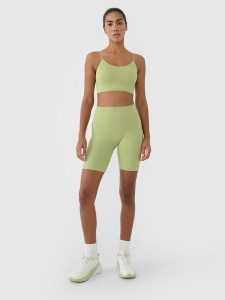 4F Legginsy kolarki bezszwowe treningowe damskie - zielone XS/S. Zielone legginsy 4f, bez wzorów, z dzianiny, z podwyższonym stanem, krótkie. W wyprzedaży za 59,99 zł.