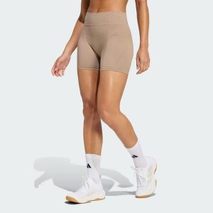 Legginsy Workout Essentials 4 inch. Brązowe legginsy ADIDAS, bez wzorów. Za 129,00 zł.