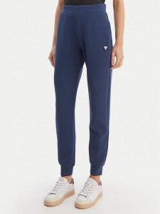 Guess Spodnie dresowe V4YB08 KCAY2 Granatowy Regular Fit. Niebieskie spodnie dresowe Guess, l, z aplikacjami, z dresówki. Za 349,99 zł.