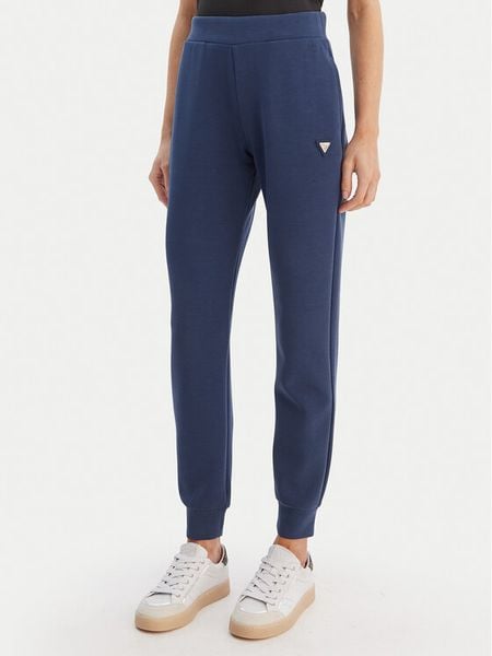 Guess Spodnie dresowe V4YB08 KCAY2 Granatowy Regular Fit. Niebieskie spodnie dresowe Guess, m, z aplikacjami, z dresówki. Za 379,99 zł.