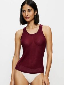 Triumph Top "Beauty" w kolorze ciemnoczerwonym rozmiar: XS. Czerwone topy Triumph, xs, bez wzorów, bez kołnierzyka, bez ramiączek. Za 65,85 zł.