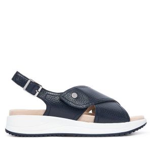 Sandały Caprice. Niebieskie sandały Caprice, bez wzorów, bez obcasa, na płaskiej podeszwie, bez zapięcia. Za 399,99 zł.