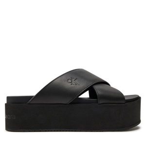 Klapki Calvin Klein Jeans. Czarne klapki Calvin Klein Jeans, bez wzorów, z jeansu, bez obcasa. Za 219,99 zł.