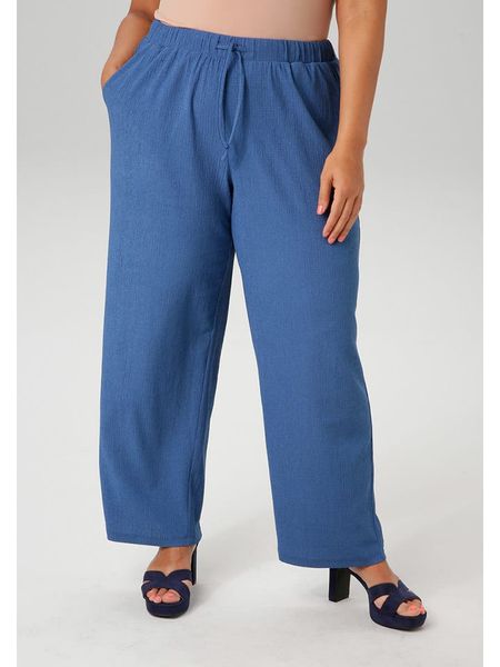 Aniston Spodnie w kolorze niebieskim rozmiar: 52. Niebieskie spodnie z wysokim stanem Aniston, bez wzorów, z materiału, z podwyższonym stanem. Za 52,30 zł.