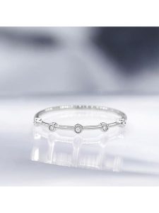 DIAMOND & CO Złoty pierścionek "Ensemble" z diamentami rozmiar: 50. Szare pierścionki Diamond & Co, z diamentem, złote. Za 505,13 zł.