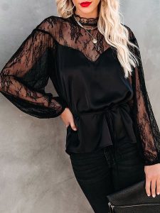 Milan Kiss Bluzka w kolorze czarnym rozmiar: XL. Czarne bluzki Milan Kiss, xl, bez wzorów, z koronki, bez kołnierzyka, bez ramiączek. Za 126,99 zł.