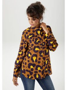 Aniston Bluzka w kolorze karmelowo-żółtym rozmiar: 38. Brązowe bluzki Aniston, bez wzorów, z wiskozy, bez kołnierzyka, bez ramiączek. Za 52,17 zł.