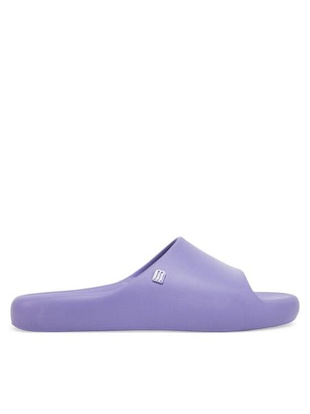 Melissa Klapki Melissa Free Print Slide Ad 33973 Fioletowy. Fioletowe klapki Melissa, bez wzorów, z tworzywa sztucznego, bez obcasa. Za 299,99 zł.