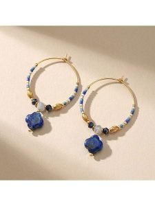 Nomad Pozłacane kolczyki-kreole z perłami i lapis lazuli rozmiar: onesize. Niebieskie kolczyki Nomad, z lazurytem, pozłacane. Za 35,95 zł.