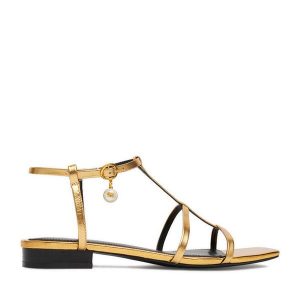 Sandały GINO ROSSI. Żółte sandały Gino Rossi, bez wzorów, bez obcasa, na płaskiej podeszwie, bez zapięcia. Za 299,99 zł.