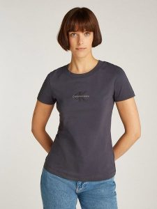 CALVIN KLEIN JEANS Koszulka w kolorze czarnym rozmiar: S. Czarne bluzki Calvin Klein Jeans, s, bez wzorów, z bawełny, bez kołnierzyka, bez ramiączek. Za 122,96 zł.