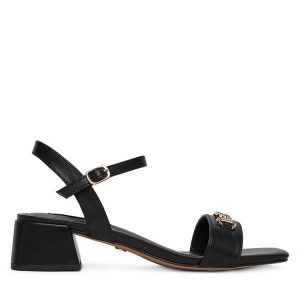 Sandały Nine West. Czarne sandały Nine West, bez wzorów, bez obcasa, na słupku, bez zapięcia. Za 229,99 zł.