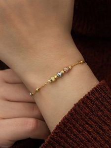 Lodie Silver Pozłacana bransoletka z elementami ozdobnymi rozmiar: onesize. Szare bransoletki Lodie Silver, pozłacane. Za 78,99 zł.