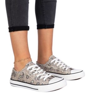 Brązowe trampki damskie materiałowe w azteckim stylu. Brązowe trampki bez wzorów, z materiału, bez zapięcia. Za 82,56 zł.