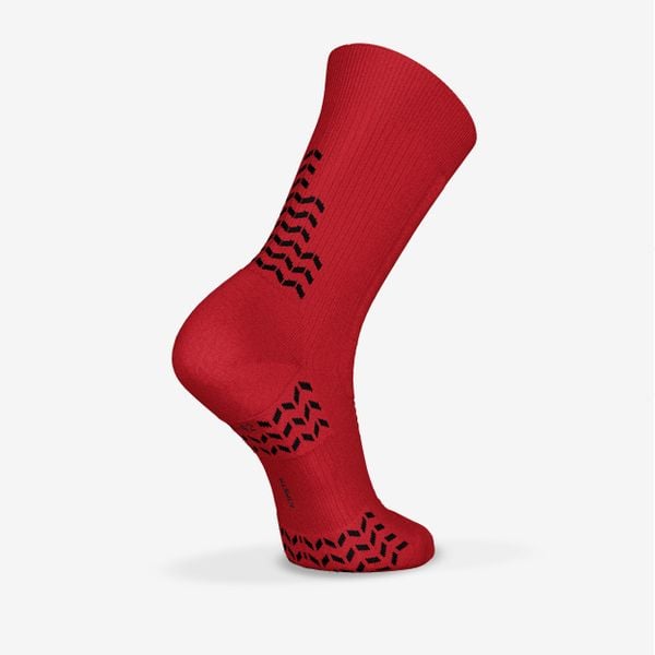 Skarpety piłkarskie podwyższone Kipsta Viralto II MiD antypoślizgowe. Czerwone skarpetki KIPSTA, bez wzorów, z dzianiny. Za 39,99 zł.