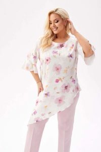 Elegancka tunika Liliana z asymetrycznym krojem w romantyczne kwiaty PLUS SIZE XXL. Czerwone tuniki Moda Size Plus Iwanek, na co dzień, plus size, bez wzorów, z elastanu, eleganckie, z asymetrycznym kołnierzem, plus size, bez ramiączek. Za 239,90 zł.