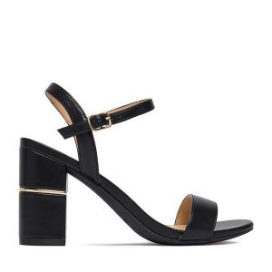 Sandały JENNY. Czarne sandały Jenny, bez wzorów, bez obcasa, na słupku, bez zapięcia. Za 129,99 zł.