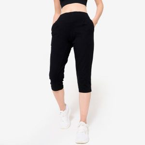 Krótkie legginsy fitness damskie Domyos. Czarne legginsy DOMYOS, bez wzorów, z bawełny, krótkie. Za 59,99 zł.