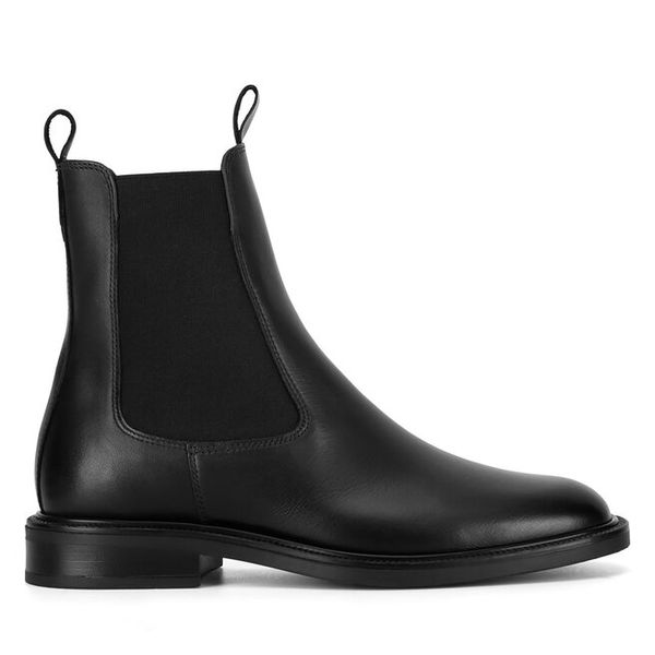 Sztyblety GINO ROSSI. Zielone botki Gino Rossi, bez wzorów, bez obcasa, na płaskiej podeszwie, bez zapięcia. Za 209,99 zł.