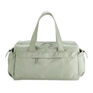 Torba podróżna z podwójnym zamkiem błyskawicznym Quadra Studio. Zielone torby podróżne i sportowe QUADRA, bez wzorów. Za 218,50 zł.