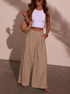 LA Angels Spodnie w kolorze beżowym rozmiar: XL. Brązowe spodnie z wysokim stanem LA Angels, bez wzorów, z materiału, z podwyższonym stanem. Za 174,95 zł.