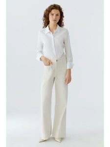 Oui Dżinsy - Comfort fit - w kolorze kremowym rozmiar: 34. Brązowe jeansy Oui, z aplikacjami, ze skóry, z podwyższonym stanem. Za 339,99 zł.