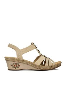 Rieker Sandały CEO-V2451-62 Beżowy. Brązowe sandały Rieker, bez wzorów, ze skóry, bez obcasa, na koturnie, bez zapięcia. Za 319,99 zł.