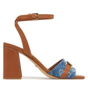 Sandały Guess. Niebieskie sandały Guess, z aplikacjami, bez obcasa, na słupku, bez zapięcia. Za 429,99 zł.
