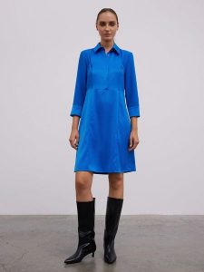 BGN Sukienka w kolorze niebieskim rozmiar: 40. Niebieskie sukienki BGN, na co dzień, bez wzorów, z tkaniny, bez kołnierzyka, bez ramiączek, midi, proste. Za 152,99 zł.