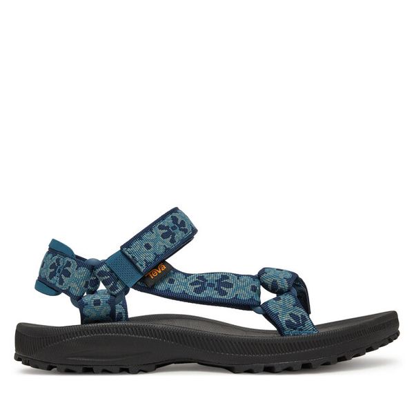 Sandały Teva. Niebieskie sandały Teva, bez wzorów, bez obcasa, na płaskiej podeszwie, bez zapięcia. Za 309,99 zł.