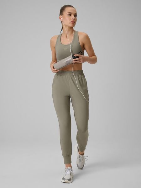 4F Spodnie treningowe szybkoschnące damskie - oliwkowe M. Brązowe spodnie dresowe 4f, m, bez wzorów. Za 179,99 zł.