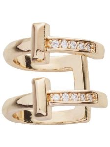 U.S. Polo Assn. Pozłacana nausznica z kryształami rozmiar: onesize. Żółte kolczyki U.S. Polo Assn., z kryształem, metalowe. Za 65,54 zł.