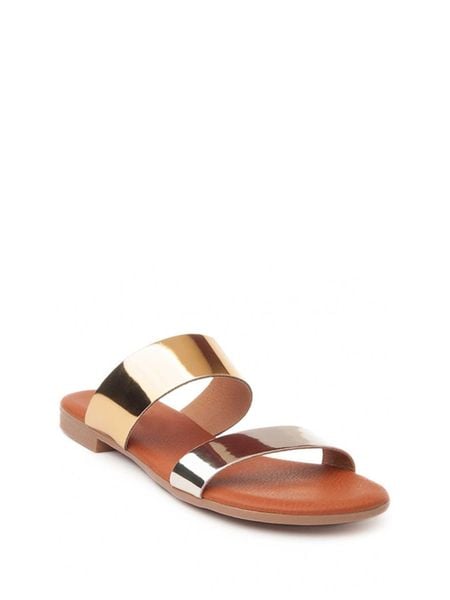 Purapiel Skórzane klapki w kolorze złoto-srebrnym rozmiar: 39. Szare klapki Purapiel, bez wzorów, ze skóry, z otwartym noskiem, bez obcasa. Za 92,21 zł.