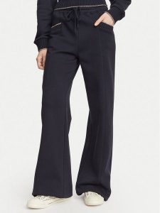 Guess Spodnie dresowe W6YB31 K5319 Granatowy Wide Leg. Niebieskie spodnie dresowe Guess, xs, z aplikacjami, z bawełny. Za 434,99 zł.