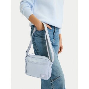 Torebka Reebok. Niebieskie listonoszki Reebok, bez wzorów, bez dodatków. Za 69,99 zł.