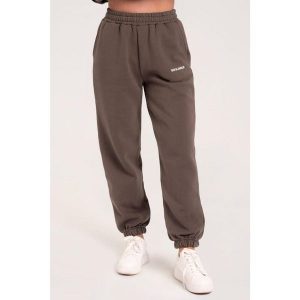 Spodnie fitness damskie Gym Glamour dresowe. Brązowe spodnie dresowe GYM GLAMOUR, l, bez wzorów, z dresówki. Za 189,99 zł.