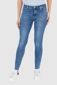7 FOR ALL MANKIND Niebieskie jeansy z wysokim stanem i poszarpanymi nogawkami HW SKINNY SLIM ILLUSION Stride. Niebieskie spodnie z wysokim stanem 7 for all mankind, bez wzorów, z bawełny, z podwyższonym stanem. W wyprzedaży za 499,99 zł.