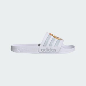 Klapki Adidas Adilette Real Madrid JS4863 - białe, unisex. Białe klapki ADIDAS, bez wzorów, z materiału, bez obcasa. Za 107,99 zł.