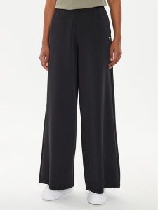 Guess Spodnie dresowe V4YB07 KCAY2 Czarny Relaxed Fit. Czarne spodnie dresowe Guess, xl, z aplikacjami, z dresówki. Za 259,99 zł.