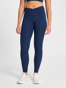 Damskie legginsy Hummel Hmlyoga Wrap High Waist. Niebieskie legginsy Hummel, bez wzorów, z elastanu, z podwyższonym stanem. Za 286,00 zł.