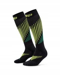 Długie skarpety kompresyjne dla kobiet z wełną Merino Core Run CEP. Zielone skarpetki CEP, bez wzorów, z dzianiny. Za 229,00 zł.